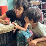 Rajveer Phade (Pune, 3.6 y/o) :  When I met siddhi after a long time, I got to know about her passion & love for Drums. I decided to send my child Rajveer phade to Drum class. I personally saw her taking so much effort for my child and trust me, teaching a 3.6 year old Music or Drums is not that easy. She started to slowly build his interest in music and this means she started knowing him - his liking, his fav music, etc. And as per his mood and liking, she started teaching him in a brilliant way. She has been very kind to my child, and my child also started gelling up with her. The most touching point for me was that Rajveer started missing his music class and siddhi ma'am. 19.06.2023